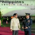 Marcos returns from India