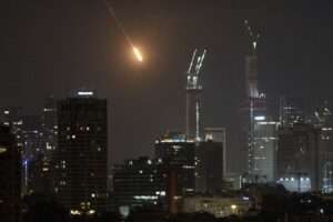 Israel and Iran exchange missile barrages amid escalating…